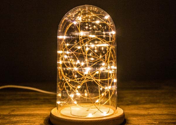 A table lamp with string lights