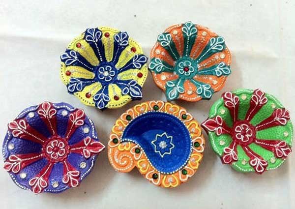 Diyas on decorated stones