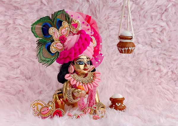 Add the beautiful Krishna Idol